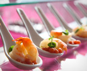 One bite shrimp appetizer on spoons