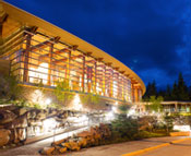 Building at night with lights on