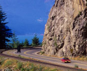 Car driving around a bend